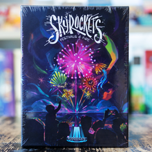 Load image into Gallery viewer, Fireworks exploding in the sky as people watch from bellow.