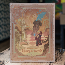 Load image into Gallery viewer, The front cover of the 'Glory of the Giants' tabletop gaming box by Bigby, featuring an ornate fantasy illustration with a giant female figure, a stone giant, and a warrior in a stylized medieval-art design.